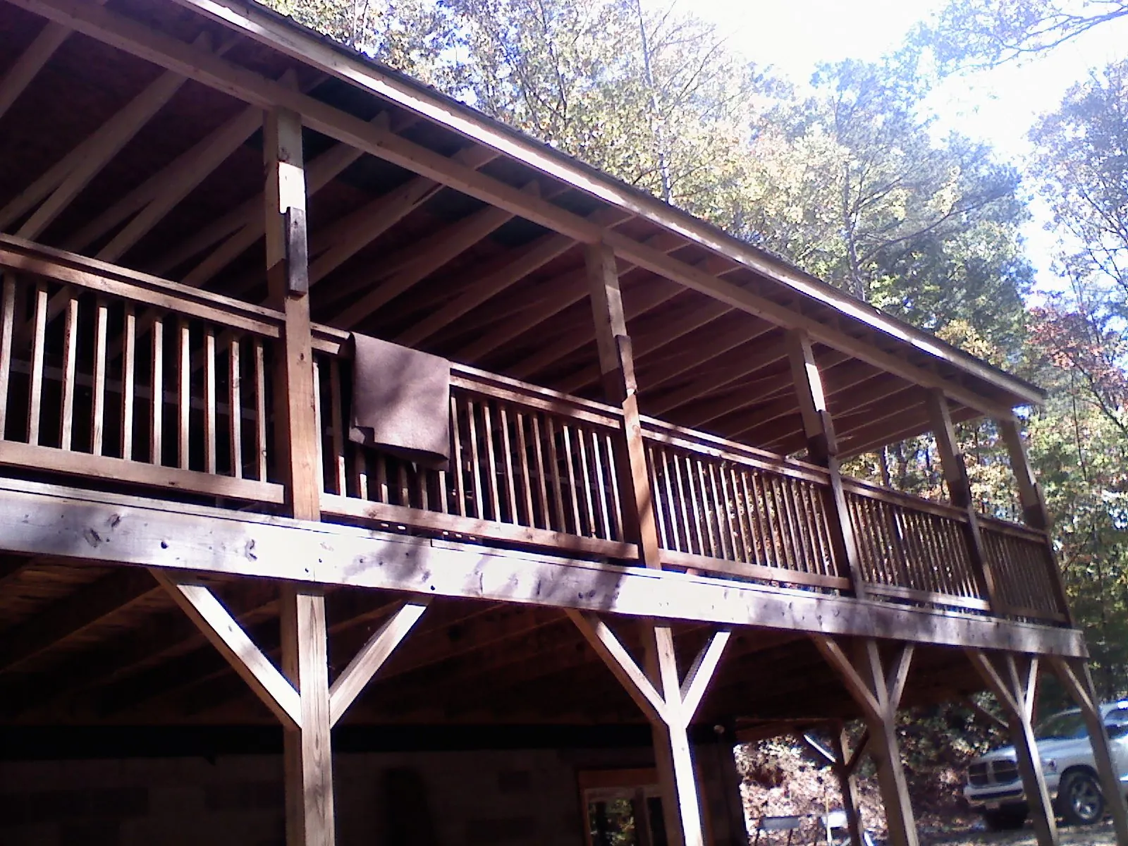 Timber framing under a new elevated porch and deck — Roof Leak Repair in Osage by Roofing Brothers